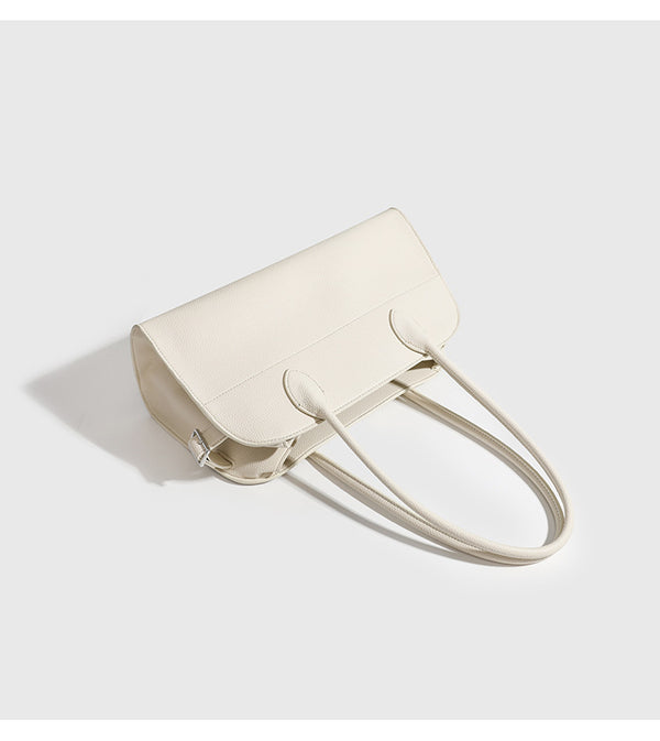 Large structured pebbled leather-look tote bag with double top handles and silver-tone hardware, detail view 11