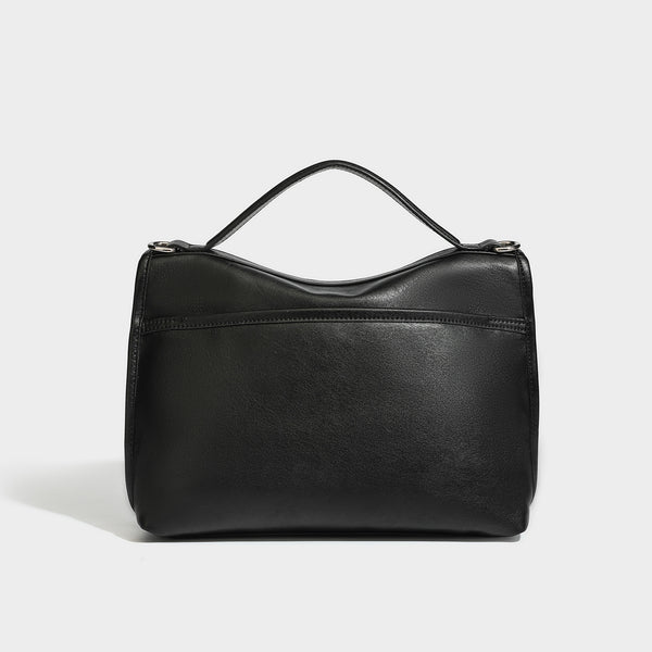 Structured rectangular flap satchel in espresso brown leather-look finish with silver-tone turn-lock buckle, top handle, and
