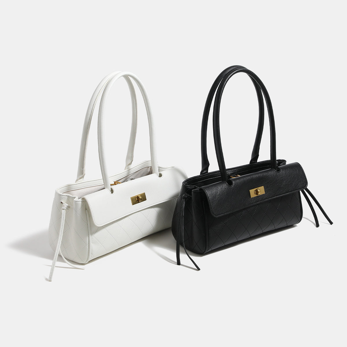Structured quilted diamond-stitch baguette handbag with gold-tone turn-lock closure and dual top handles, detail view 2
