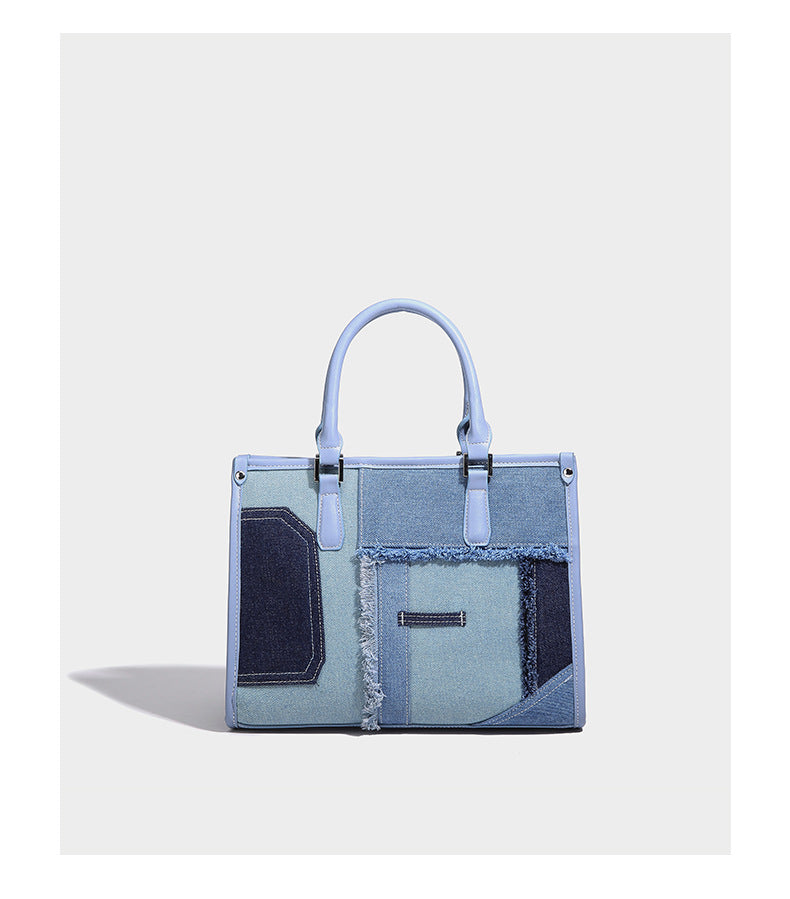 Structured patchwork denim tote bag with frayed panel seams, dual top handles, and silver-tone hardware, detail view 7