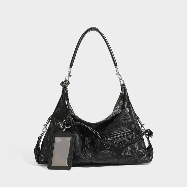 Slouchy hobo shoulder bag in crinkled metallic brown leather-look finish with braided rope knots, silver-tone hardware