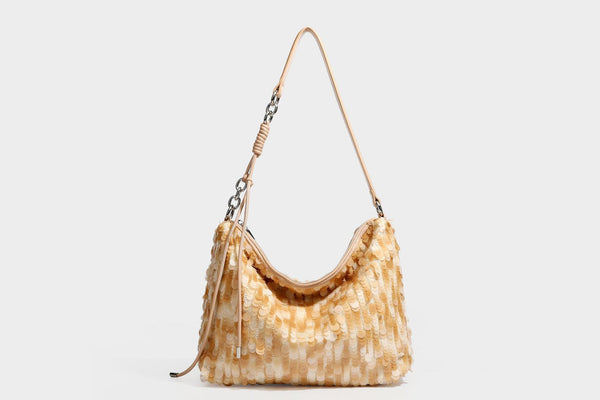 Slouchy paillette sequin hobo shoulder bag with zip closure and adjustable leather-look strap with silver chain hardware