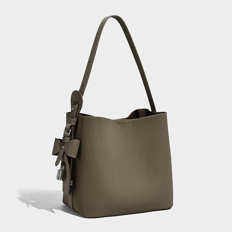 Pebbled leather-look bucket shoulder bag with zip inner pouch and adjustable crossbody strap, detail view 7
