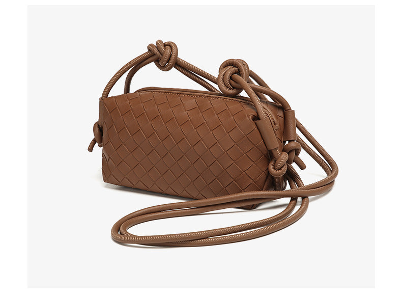 Small rectangular woven-texture mini crossbody bag with knotted rope strap and gold-tone zip closure, detail view 20