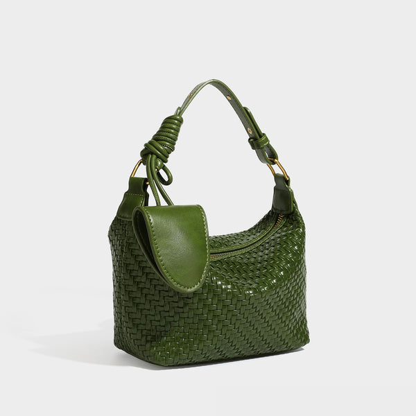 Small glossy basket-weave hobo shoulder bag in brown with knotted top handle, flap accent pocket, and gold-tone hardware