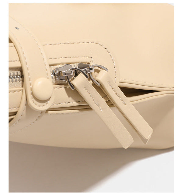 Structured leather-look zip-top tote satchel with twin handles, front turn-lock strap, hanging ID tag, and silver-tone