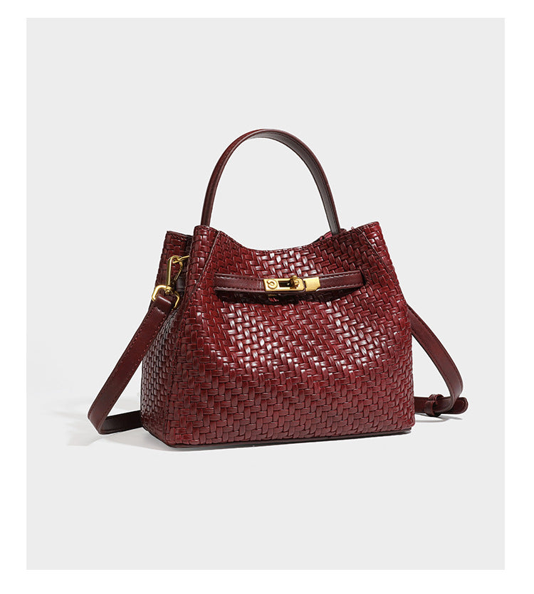 Structured woven leather-look bucket bag with gold-tone turn-lock hardware and detachable shoulder strap, detail view 20