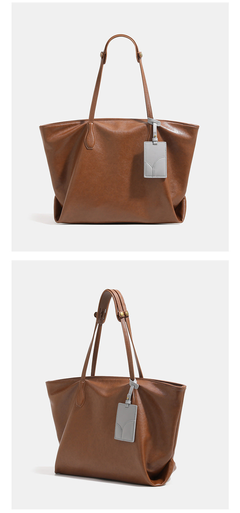 Large soft trapezoid tote bag with leather-look finish, dual shoulder straps, and gray hanging card tag, detail view 9