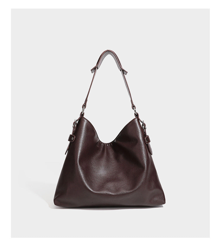 Large slouchy hobo shoulder bag in dark brown with smooth leather-look finish, adjustable strap, and silver-tone hardware