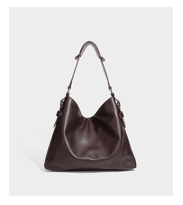 Large slouchy hobo shoulder bag in dark brown with smooth leather-look finish, adjustable strap, and silver-tone hardware
