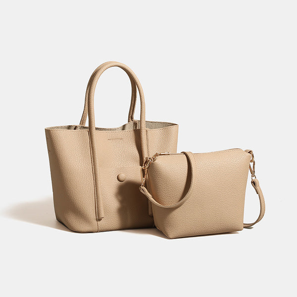Structured pebbled matte tote bag with front snap pocket, dual top handles, and detachable zip pouch in almond beige, detail