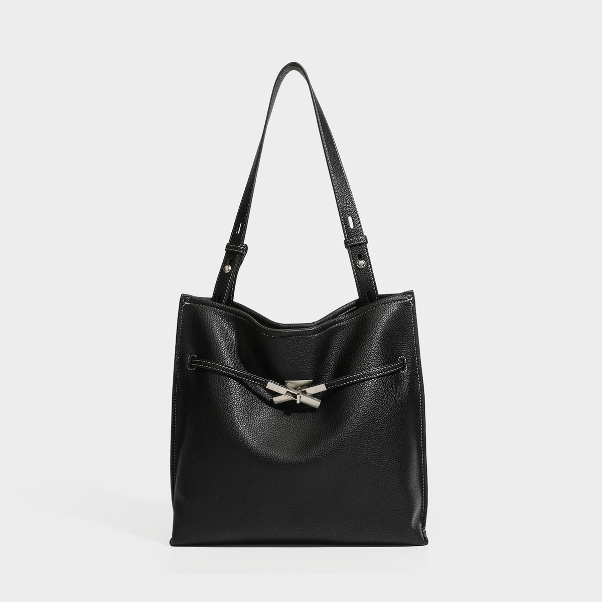 Pebbled leather-look tote bag with front toggle hardware and long shoulder strap, detail view 6