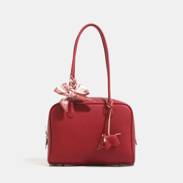 Strukturierte Boston-Tasche mit kurzem Henkel aus genarbtem lederähnlichem Material, Seidenschal-Bindung und Metallfüßchen, Detailansicht 7