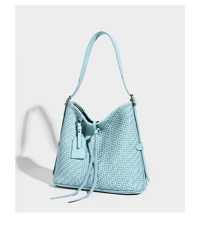 Slouchy woven-texture bucket shoulder bag with tassel tie closure and gold-tone hardware, detail view 15