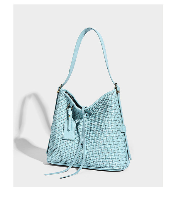Slouchy woven-texture bucket shoulder bag with tassel tie closure and gold-tone hardware, detail view 15
