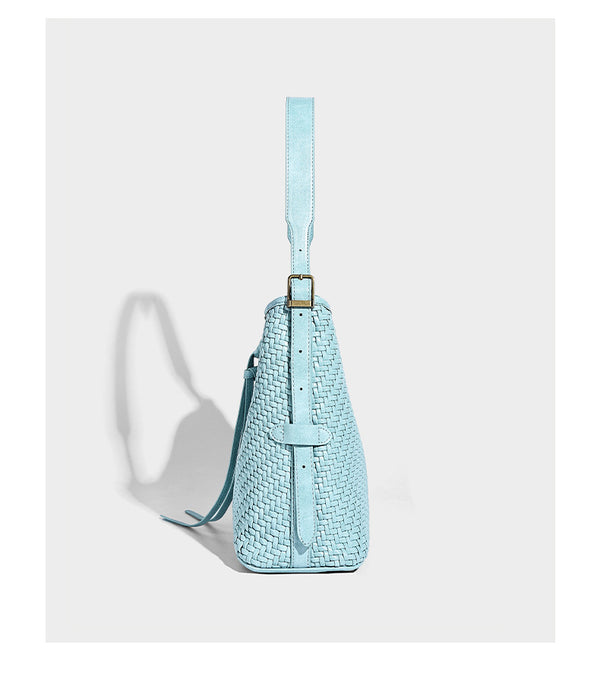Slouchy woven-texture bucket shoulder bag with tassel tie closure and gold-tone hardware, detail view 16