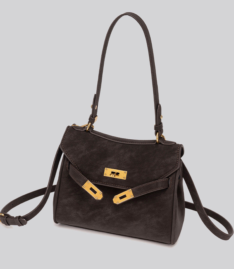 Structured dark brown flap satchel with gold-tone turn-lock hardware and detachable shoulder strap, detail view 16