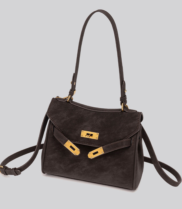 Structured dark brown flap satchel with gold-tone turn-lock hardware and detachable shoulder strap, detail view 16