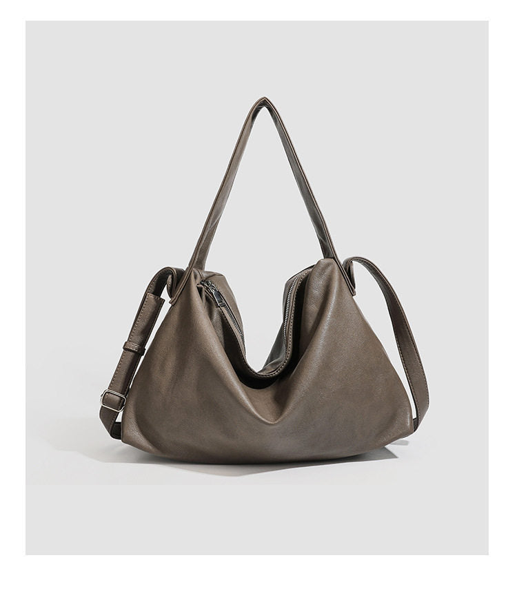 Slouchy leather-look hobo shoulder bag with top zipper and silver-tone hardware, detail view 10