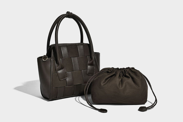 Small structured woven-panel mini tote bag with double top handles and detachable crossbody strap in matte leather-look