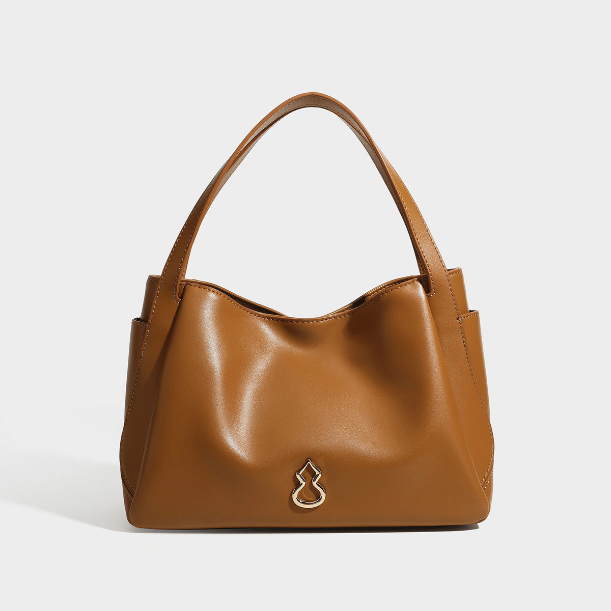 Structured glossy leather-look tote shoulder bag with dual top handles, detachable crossbody strap, side pockets, and, detail