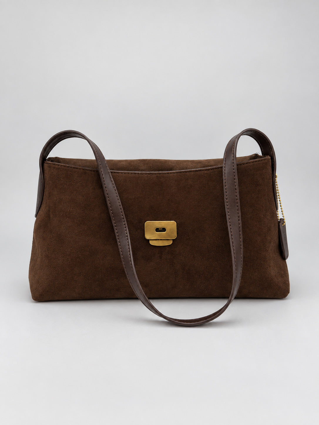 Rectangular matte suede-finish flap shoulder bag with slim dark strap and gold-tone turn-lock hardware, detail view 20