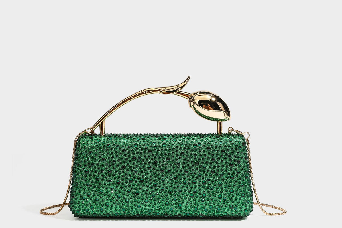 rectangular hard-case rhinestone evening clutch with sculptural gold-tone branch-and-bud top handle and detachable chain