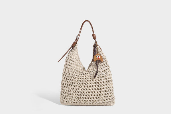 Slouchy open-knit crochet hobo tote bag with leather-look top handle and metal buckle hardware, detail view 13