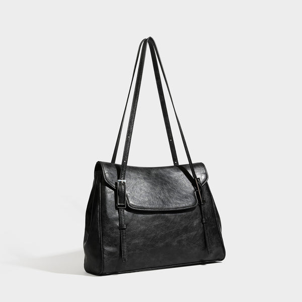 Structured flap-top shoulder tote bag in distressed leather-look finish with silver-tone buckle hardware and double shoulder
