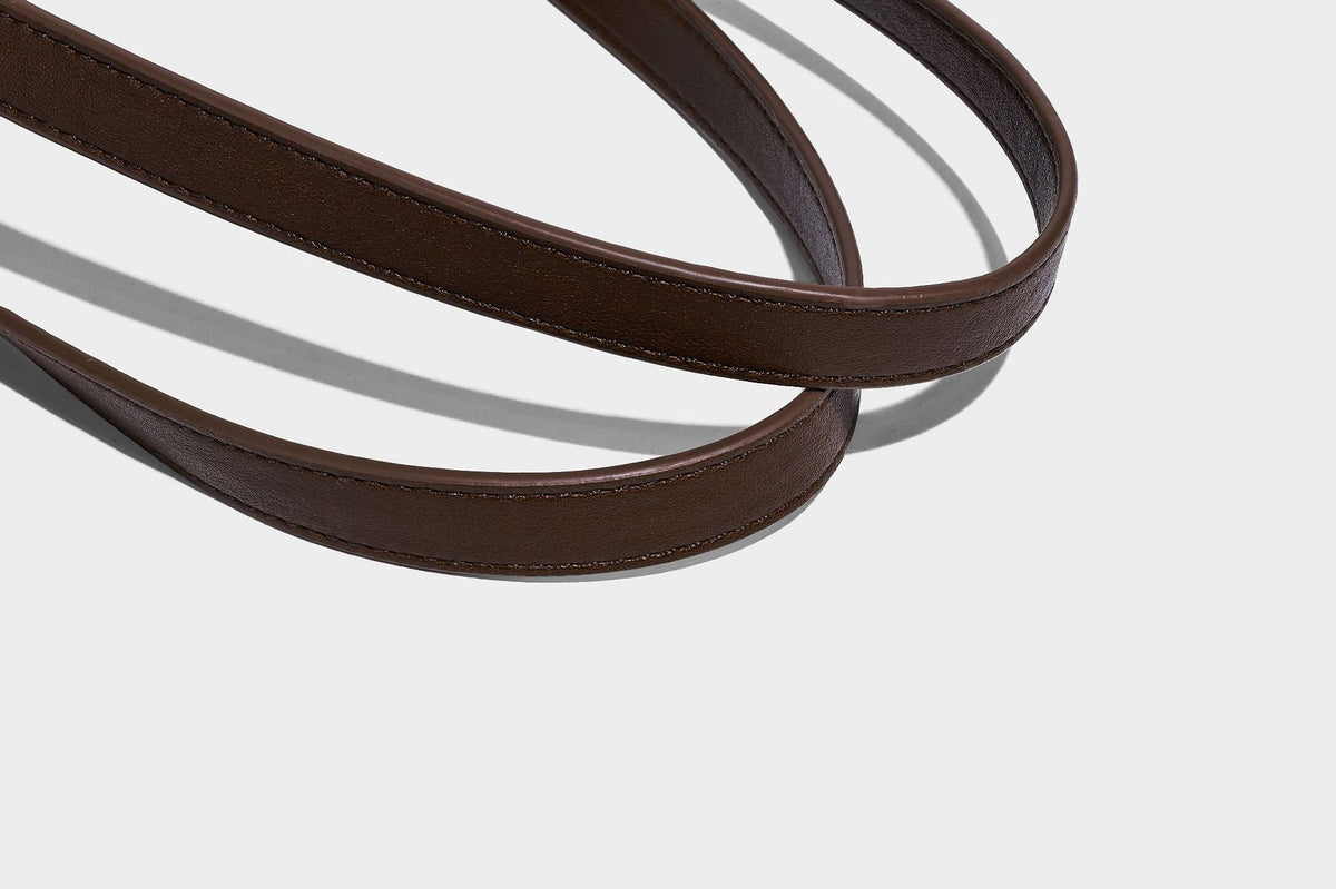 Structured suede-look shopper tote with wraparound belt strap and gold turn-lock clasp, long dark brown shoulder handles