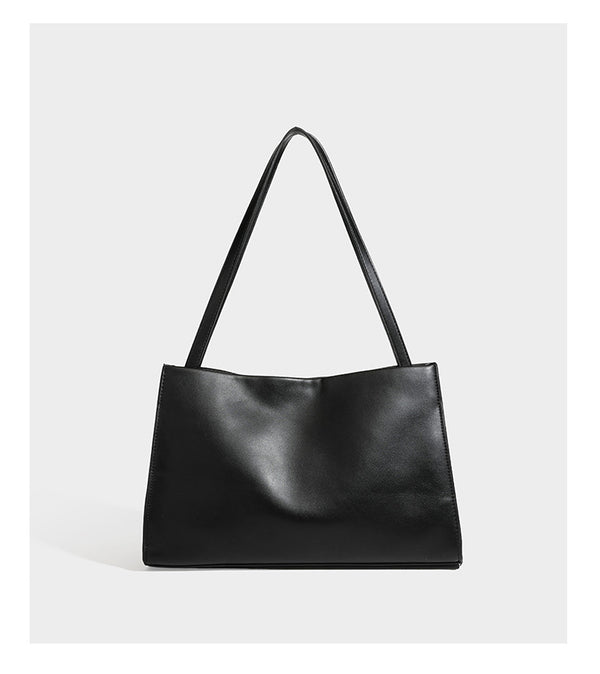 Structured rectangular shoulder tote bag with smooth leather-look finish, long double straps, and gold-tone gourd emblem on
