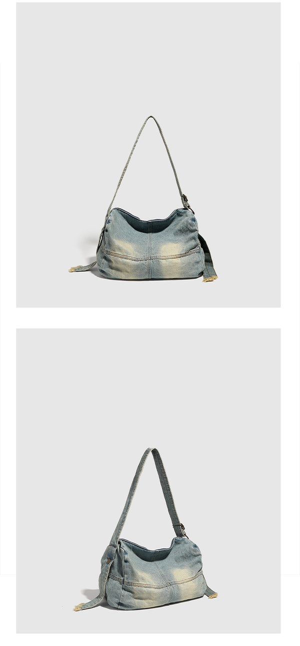 Lässige Schultertasche aus verwaschenem Denim mit ausgebleichtem Used-Look, Reißverschluss oben und verstellbarem Riemen in Antik-Messingoptik
