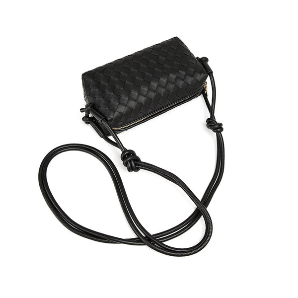 Small rectangular woven-texture mini crossbody bag with knotted rope strap and gold-tone zip closure, detail view 4