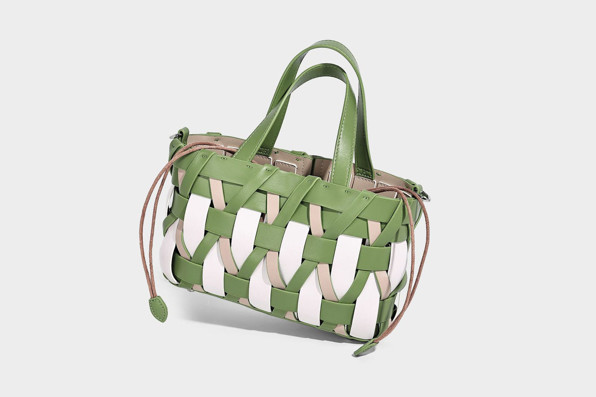 Small structured woven lattice tote bag with dual top handles and detachable shoulder strap in brown and cream leather-look
