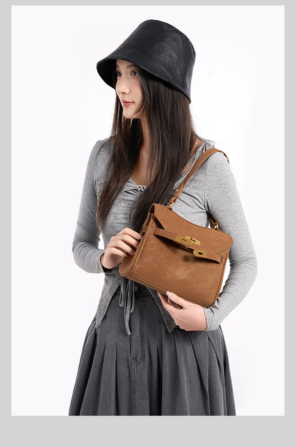 Structured dark brown flap satchel with gold-tone turn-lock hardware and detachable shoulder strap, detail view 13