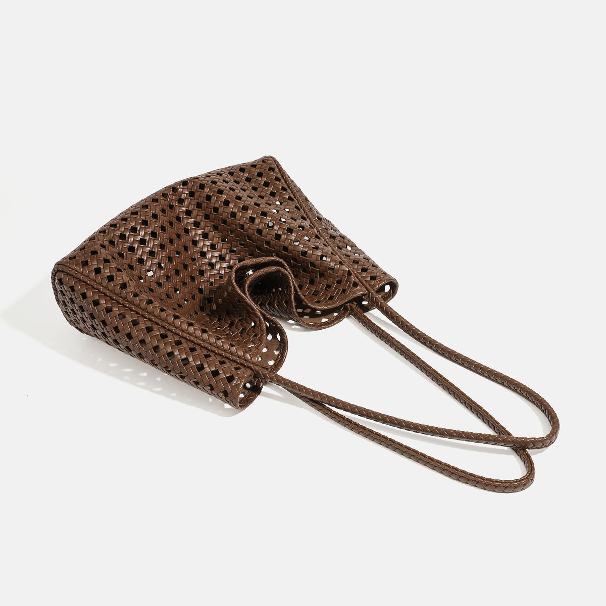 Slouchy open-lattice woven shoulder tote bag with long braided straps and matching zip pouch, detail view 4