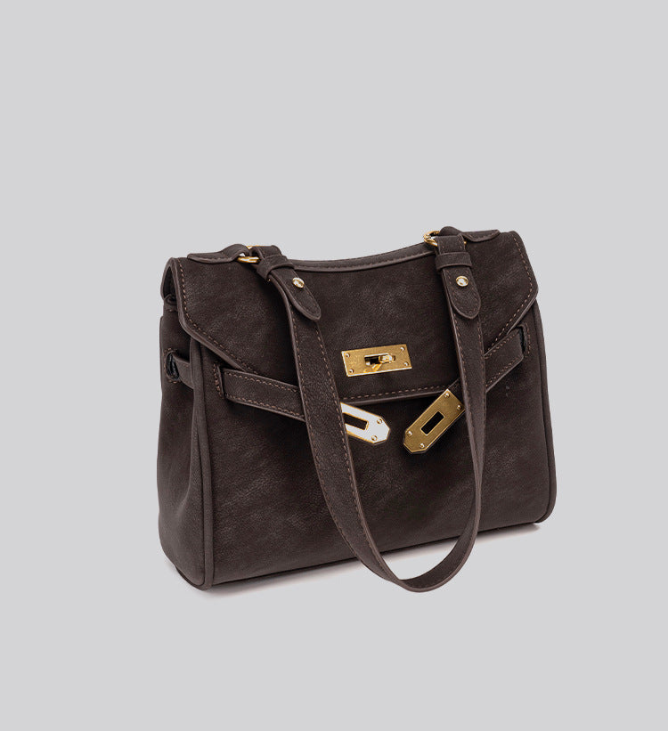 Structured dark brown flap satchel with gold-tone turn-lock hardware and detachable shoulder strap, detail view 18