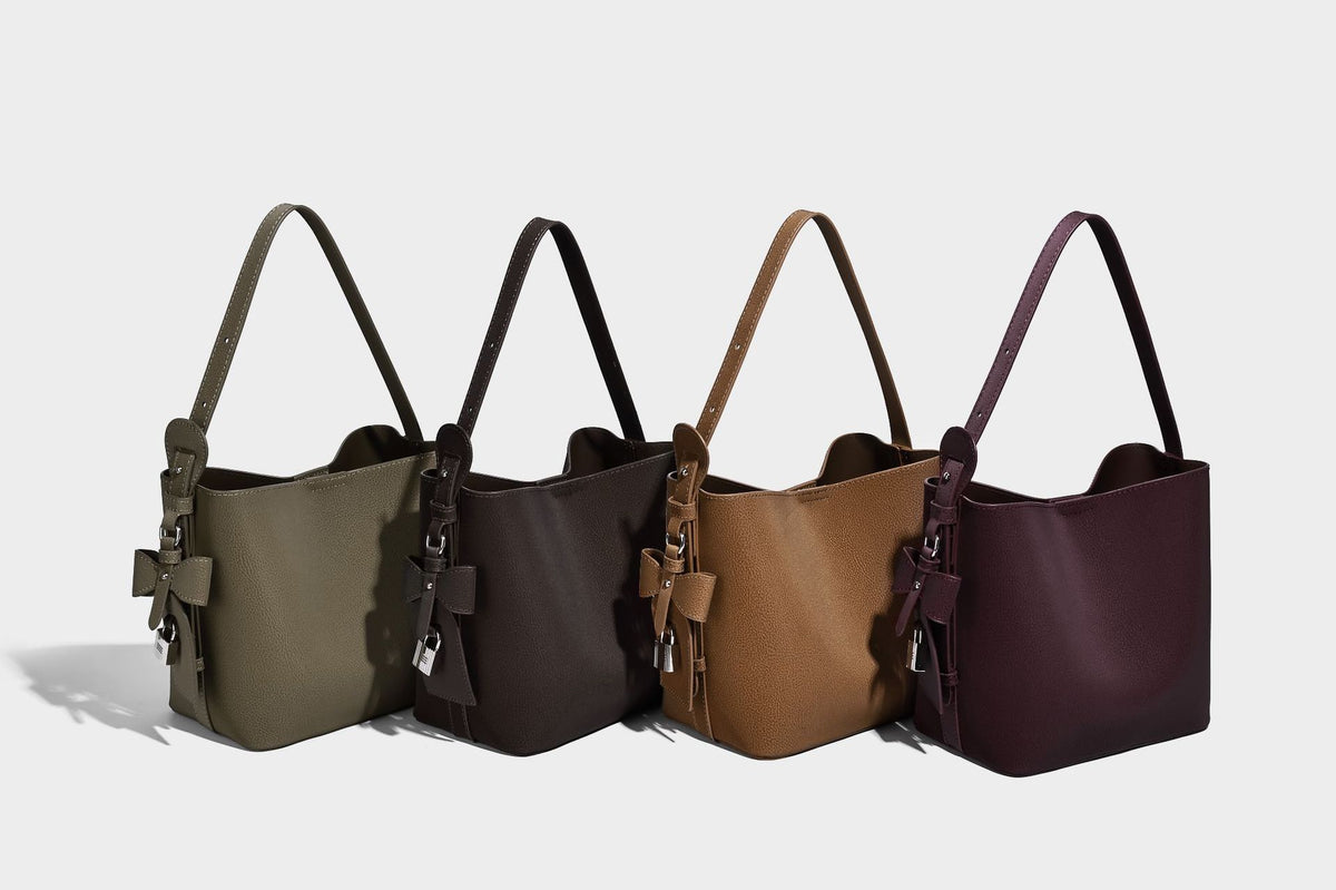 Pebbled leather-look bucket shoulder bag with zip inner pouch and adjustable crossbody strap, detail view 24