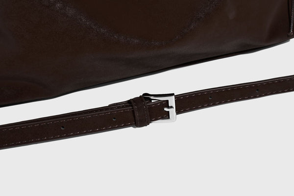 Slouchy matte-finish hobo shoulder bag with tassel cords, silver-tone hardware, and faux-fur pom charm, detail view 21