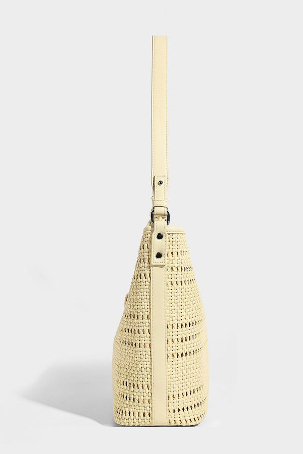Handwoven open-weave shoulder bag with leather-look trim, knotted adjustable strap, and clip-on sunglasses sleeve pouch