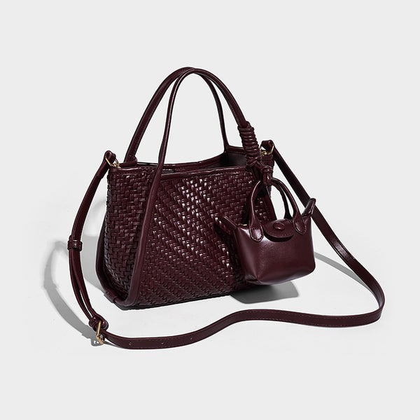 Woven texture open-top tote bag with smooth trim top handles and attached mini drawstring pouch in dark brown, detail view 10