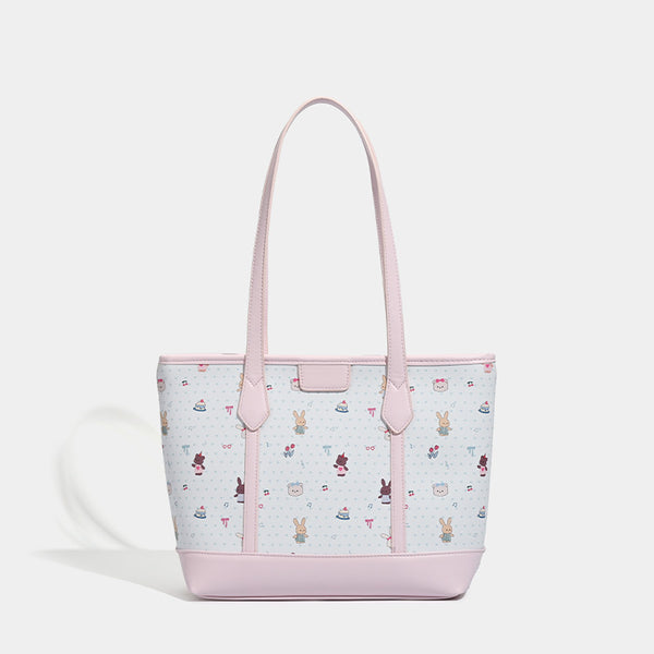 Große, strukturierte Tote-Bag mit Reißverschluss oben, Einsätzen mit pastellfarbenem Cartoon-Print, glattem Besatz in rosafarbener Lederoptik und zwei Schulterriemen