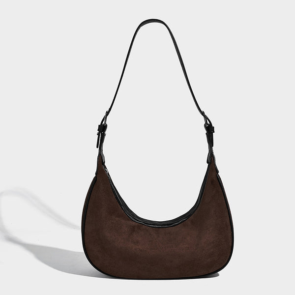 Crescent hobo shoulder bag in matte suede-look finish with black trim and adjustable strap, detail view 3