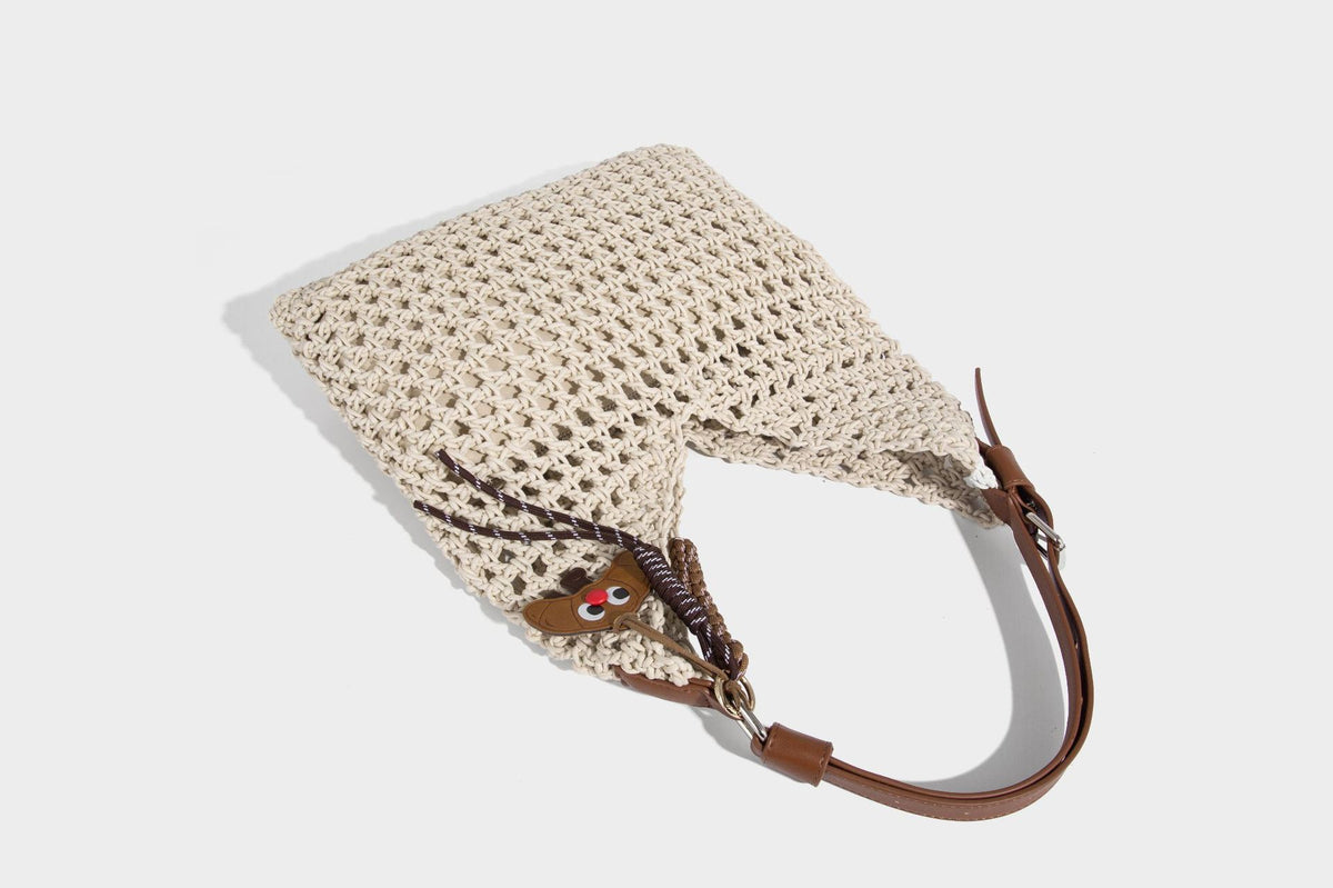 Slouchy open-knit crochet hobo tote bag with leather-look top handle and metal buckle hardware, detail view 21