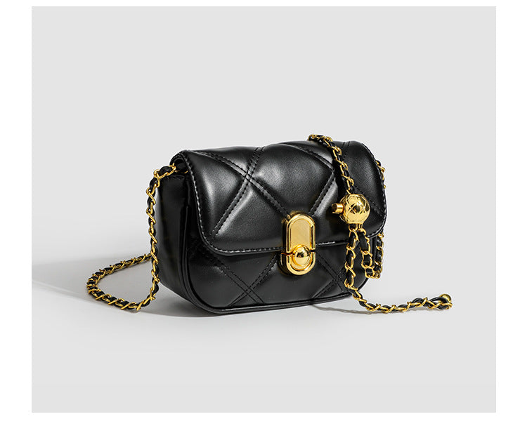 Compact diamond-quilted mini crossbody bag with gold-tone turn-lock closure and woven chain strap, detail view 15