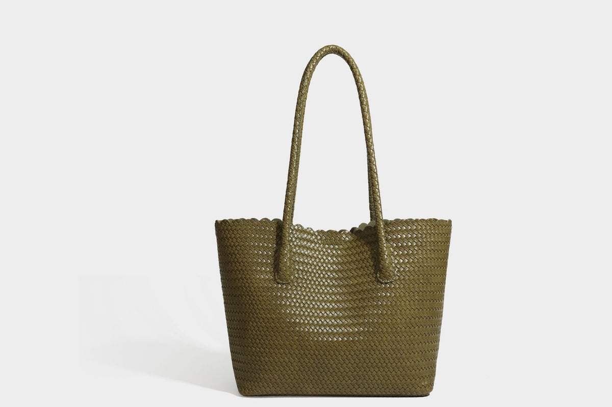 Large open-top woven leather-look tote bag in dark brown with scalloped edge, braided double shoulder straps, and decorative