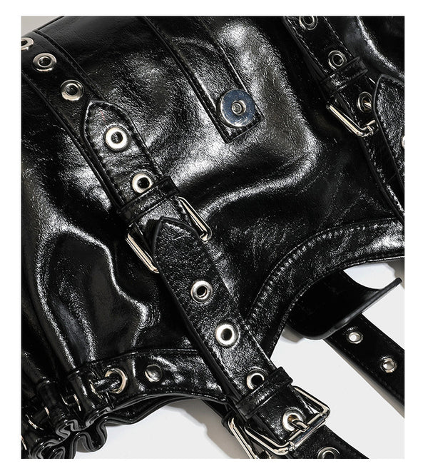 Large black glossy leather-look tote bag with silver buckle straps, eyelet grommet panels, drawstring side gathers, and