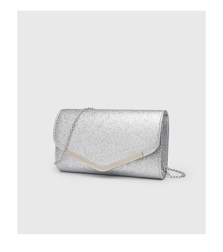 Structured glitter envelope clutch bag with gold-tone V-bar hardware and detachable chain strap, detail view 13