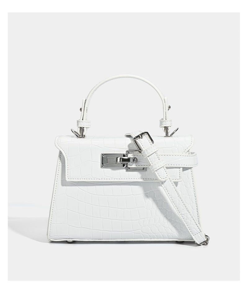 Croc-embossed mini top-handle satchel with silver turn-lock closure and adjustable crossbody strap, detail view 19