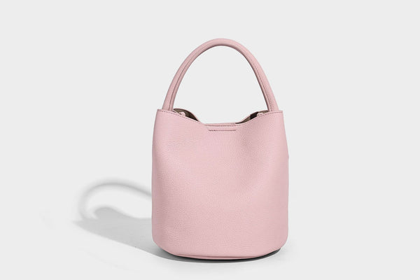 Mini pebbled leather-look bucket bag with front buckle strap, silver-tone hardware, top handle, and detachable shoulder